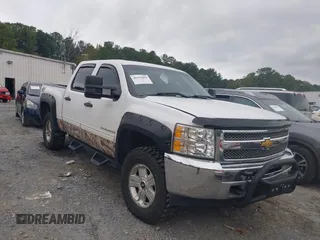 2013 Chevrolet Silverado 1500 LS with VIN 3GCPKREA1DG260052, listed as a IAAI auction lot 40459099 with 171,718 mi miles and . Bid and sale history available at DreamBid. Image 1.