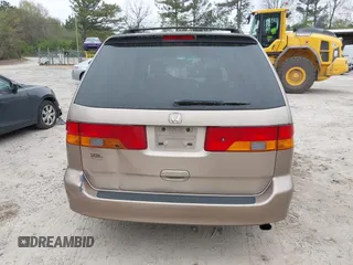 2004 Honda Odyssey EX with VIN 5FNRL18684B072343, listed as a IAAI auction lot 41945142 with 222,990 mi miles and . Bid and sale history available at DreamBid. Image 16.