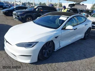 2022 Tesla Model S with VIN 5YJSA1E56NF493062, listed as a IAAI auction lot 41616427 with 41,874 mi miles. Bid and sale history available at carsss.com. Image 2.