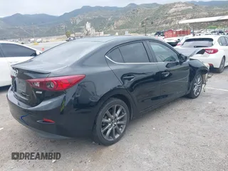 2018 Mazda 3 Touring with VIN 3MZBN1V30JM201671, listed as a IAAI auction lot 42189105 with 174,284 mi miles and . Bid and sale history available at carsss.com. Image 4.