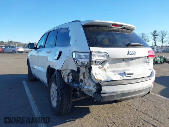 2019 Jeep Grand Cherokee Laredo E with VIN 1C4RJFAG7KC694674, listed as a IAAI auction lot 41591678 with 61,144 mi miles. Bid and sale history available at carsss.com. Image 6.