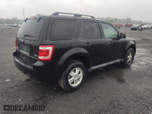 2012 Ford Escape XLT with VIN 1FMCU0DG1CKA04684, listed as a IAAI auction lot 42502108 with 143,138 mi miles and . Bid and sale history available at DreamBid. Image 4.