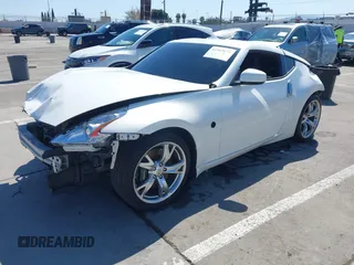 2009 Nissan 370Z Touring with VIN JN1AZ44E99M411252, listed as a IAAI auction lot 41969671 with 91,873 mi miles and . Bid and sale history available at DreamBid. Image 18.