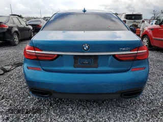 2019 BMW 7 Series 750i z VIN WBA7F0C51KGM25707, wystawiony jako Copart lot #61950495 z przebiegiem 56 768 mil mil oraz Nie do naprawy • Non repairable. Historia ofert i sprzedaży dostępna na DreamBid. Obrazek 6.