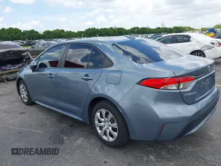 2020 Toyota Corolla LE with VIN 5YFEPRAE2LP070450, listed as a IAAI auction lot 40061850 with 62,850 mi miles. Bid and sale history available at carsss.com. Image 3.