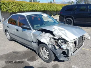 1999 Honda Civic LX with VIN 2HGEJ6671XH576634, listed as a IAAI auction lot 41829474 with 215,979 mi miles. Bid and sale history available at carsss.com. Image 1.