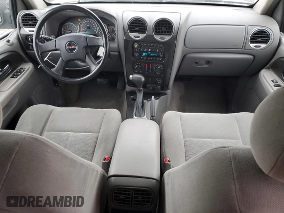 2005 GMC Envoy SLT with VIN 1GKDS13S452258553, listed as a Copart auction lot 82888944 with 174,546 mi miles and Salvage Title. Bid and sale history available at carsss.com. Image 8.