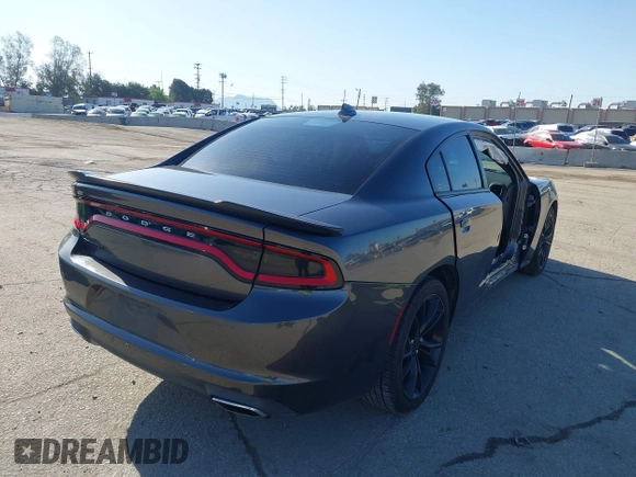 2016 Dodge Charger SXT with VIN 2C3CDXHG6GH327461, listed as a IAAI auction lot 41955412 with 124,775 mi miles and . Bid and sale history available at carsss.com. Image 4.