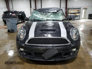 2013 MINI Convertible S with VIN WMWZP3C51DT297891, listed as a Copart auction lot 56745065 with 101,292 mi miles and Salvage title. Bid and sale history available at DreamBid. Image 5.
