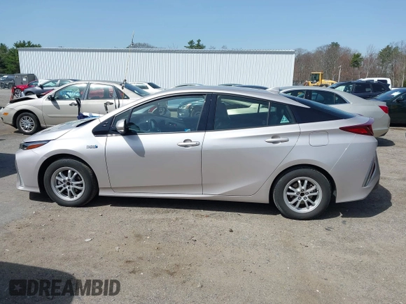 2018 Toyota Prius Plus with VIN JTDKARFP5J3091877, listed as a IAAI auction lot 42129355 with 48,736 mi miles and . Bid and sale history available at DreamBid. Image 14.