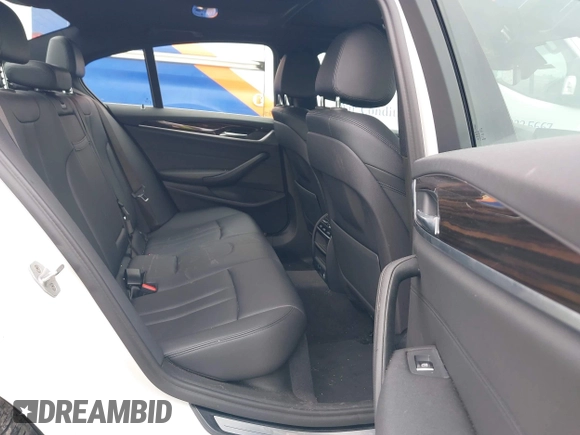 2018 BMW 5 Series 530i xDrive with VIN WBAJA7C5XJG907944, listed as a IAAI auction lot 42290336 with 111,512 mi miles and . Bid and sale history available at DreamBid. Image 8.