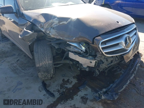 2014 Mercedes-Benz E 550 Sport with VIN WDDHF9BB5EA971894, listed as a IAAI auction lot 41405571 with 113,363 mi miles and . Bid and sale history available at DreamBid. Image 6.