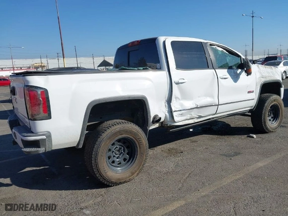 2016 GMC Sierra 1500 SLT with VIN 3GTU2NEC2GG244329, listed as a IAAI auction lot 40810002 with 121,716 mi miles. Bid and sale history available at carsss.com. Image 4.