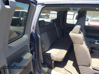 2006 Ford F-150 XLT with VIN 1FTPX14586FA70017, listed as a IAAI auction lot 42127525 with 100,555 mi miles. Bid and sale history available at carsss.com. Image 8.