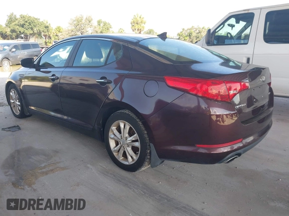 2013 Kia Optima EX z VIN 5XXGN4A71DG142137, wystawiony jako IAAI lot #42681081 z przebiegiem 115 892 mil mil oraz . Historia ofert i sprzedaży dostępna na DreamBid. Obrazek 3.