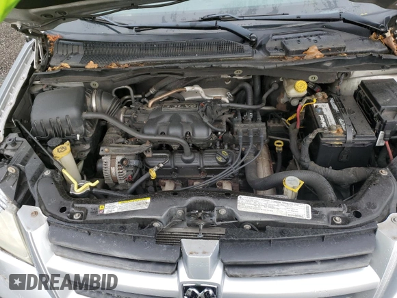 2009 Dodge Grand Caravan SE with VIN 2D8HN44E99R541957, listed as a Copart auction lot 60810425 with 172,392 mi miles and Salvage title. Bid and sale history available at DreamBid. Image 12.