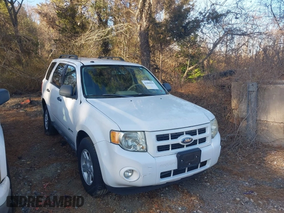 2009 Ford Escape Hybrid with VIN 1FMCU59309KA42631, listed as a IAAI auction lot 41809054 with 140,696 mi miles and . Bid and sale history available at DreamBid. Image 1.