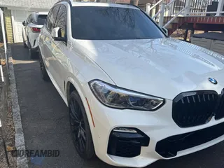 2021 BMW X5 M50i with VIN 5UXJU4C09M9H07838, listed as a Copart auction lot 47020525 with 57,200 mi miles and Clean Title. Bid and sale history available at carsss.com. Image 1.