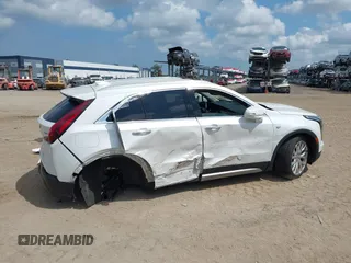 2019 Cadillac XT4 AWD Premium Luxury z VIN 1GYFZDR48KF131619, wystawiony jako IAAI lot #42202281 z przebiegiem 67 048 mil mil oraz . Historia ofert i sprzedaży dostępna na DreamBid. Obrazek 13.
