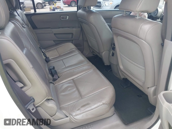 2014 Honda Pilot EX-L with VIN 5FNYF4H52EB055549, listed as a IAAI auction lot 42086456 with 292,594 mi miles and . Bid and sale history available at carsss.com. Image 8.