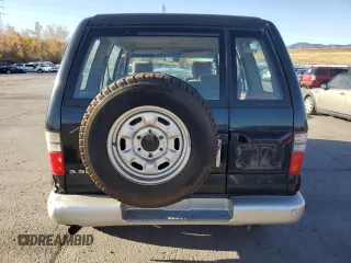 2001 Isuzu Trooper S z VIN JACDJ58X217J01836, wystawiony jako Copart lot #77548874 z przebiegiem Nie podano mil oraz Tytuł czysty. Historia ofert i sprzedaży dostępna na DreamBid. Obrazek 6.