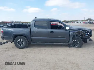 2021 Toyota Tacoma 4WD SR with VIN 3TMCZ5AN4MM387519, listed as a IAAI auction lot 41769922 with 61,813 mi miles. Bid and sale history available at carsss.com. Image 14.
