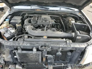 2005 Nissan Frontier SE with VIN 1N6AD06W45C402708, listed as a Copart auction lot 43715675 with 174,745 mi miles and Salvage title. Bid and sale history available at DreamBid. Image 13.