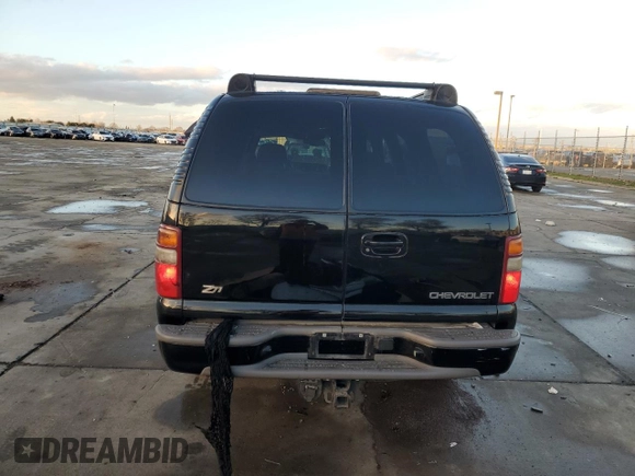 2001 Chevrolet Suburban LS z VIN 3GNFK16T91G221421, wystawiony jako Copart lot #87094634 z przebiegiem 186 977 mil mil oraz Szkoda całkowita • Salvage title. Historia ofert i sprzedaży dostępna na DreamBid. Obrazek 6.