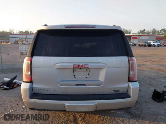 2020 GMC Yukon XL SLT z VIN 1GKS1GKC6LR238395, wystawiony jako IAAI lot #41522887 z przebiegiem Nie podano mil oraz . Historia ofert i sprzedaży dostępna na DreamBid. Obrazek 16.