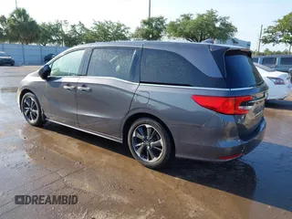2023 Honda Odyssey Elite z VIN 5FNRL6H98PB017788, wystawiony jako IAAI lot #42312586 z przebiegiem 16 208 mil mil oraz . Historia ofert i sprzedaży dostępna na DreamBid. Obrazek 3.