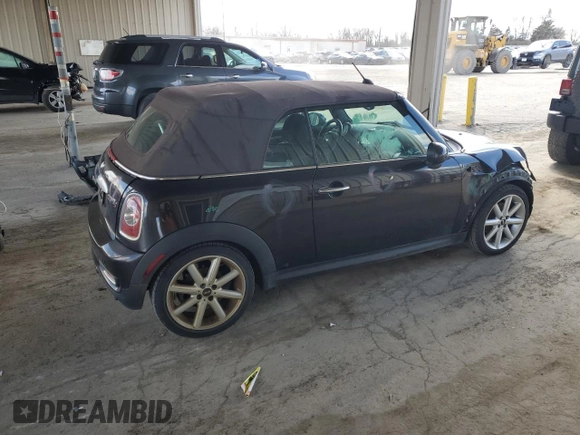 2014 MINI Convertible S with VIN WMWZP3C55ET706573, listed as a Copart auction lot 52325705 with 125,076 mi miles and Salvage Title. Bid and sale history available at DreamBid. Image 3.