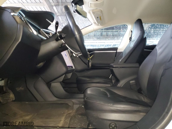 2013 Tesla Model S with VIN 5YJSA1CN3DFP18605, listed as a Copart auction lot 45302655 with 137896 miles and Salvage Title. Bid and sale history available at carsss.com. Image 7.