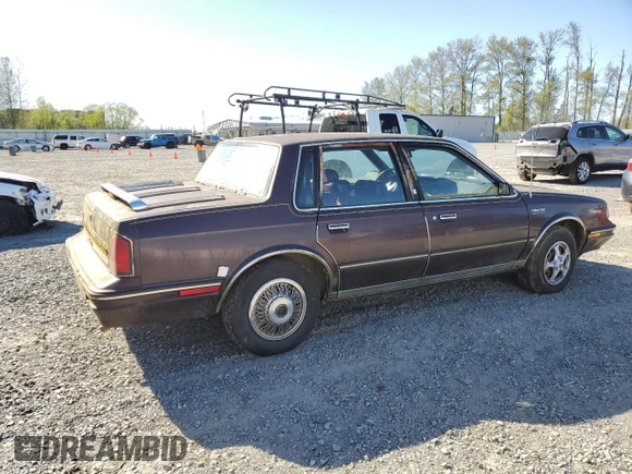 1987 Oldsmobile Cutlass Ciera with VIN 2G3AM51RXH9391582, listed as a Copart auction lot 53736795 with 81,728 mi miles and Clean Title. Bid and sale history available at DreamBid. Image 3.