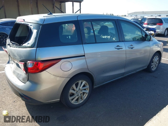 2012 Mazda 5 Sport z VIN JM1CW2BL3C0115906, wystawiony jako IAAI lot #42062899 z przebiegiem 124 286 mil mil oraz . Historia ofert i sprzedaży dostępna na DreamBid. Obrazek 4.