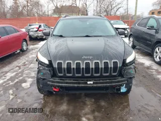 2017 Jeep Cherokee Trailhawk L Plus with VIN 1C4PJMBB9HW551506, listed as a IAAI auction lot 41650841 with 51,273 mi miles. Bid and sale history available at carsss.com. Image 13.