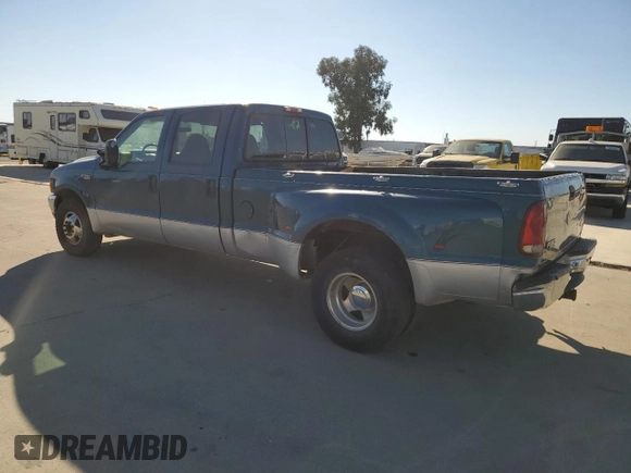 2000 Ford F-350 with VIN 1FTWW32S9YED99031, listed as a Copart auction lot 75952254 with 220,673 mi miles and Salvage title. Bid and sale history available at DreamBid. Image 2.