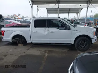 2019 Ford F-150 XL with VIN 1FTEW1CPXKKC50999, listed as a IAAI auction lot 41862139 with 61,375 mi miles and . Bid and sale history available at DreamBid. Image 14.