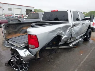 2017 Ram 2500 Tradesman z VIN 3C6UR5CL3HG529578, wystawiony jako IAAI lot #41992645 z przebiegiem 144 117 mil mil oraz . Historia ofert i sprzedaży dostępna na DreamBid. Obrazek 4.