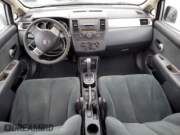 2011 Nissan Versa S with VIN 3N1BC1AP9BL458761, listed as a Copart auction lot 57317115 with 122,606 mi miles and Salvage title. Bid and sale history available at DreamBid. Image 8.