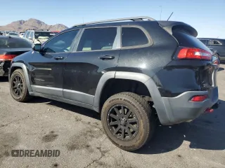 2015 Jeep Cherokee Trailhawk with VIN 1C4PJMBS8FW699319, listed as a Copart auction lot 61612245 with 173,581 mi miles and Clean title. Bid and sale history available at DreamBid. Image 2.