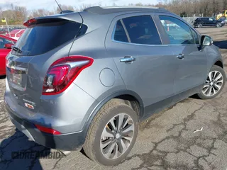 2019 Buick Encore Essence with VIN KL4CJGSM7KB927386, listed as a IAAI auction lot 40979134 with 77,784 mi miles. Bid and sale history available at carsss.com. Image 4.