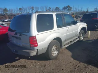 2001 Ford Explorer Sport z VIN 1FMYU60E51UC10105, wystawiony jako IAAI lot #41318866 z przebiegiem 87 218 mil mil oraz . Historia ofert i sprzedaży dostępna na DreamBid. Obrazek 4.