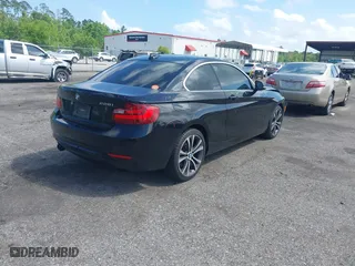 2016 BMW 2 Series 228i xDrive with VIN WBA1G9C50GVX97193, listed as a IAAI auction lot 41999973 with 79,965 mi miles. Bid and sale history available at carsss.com. Image 4.