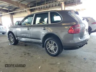 2010 Porsche Cayenne with VIN WP1AB2AP0ALA50336, listed as a Copart auction lot 62089865 with 153,942 mi miles and Salvage title. Bid and sale history available at DreamBid. Image 2.