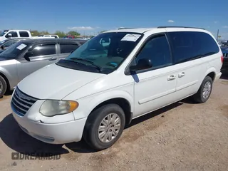 2005 Chrysler Town & Country LX with VIN 2C4GP44R75R213048, listed as a IAAI auction lot 42068985 with 100,688 mi miles and . Bid and sale history available at DreamBid. Image 2.