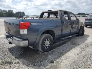 2010 Toyota Tundra с VIN 5TFUM5F15AX005061, выставлен на аукционе Copart как лот 51823565 с пробегом Не указан миль и Списание • Salvage title. История ставок и продаж доступна на DreamBid. Изображение 3.