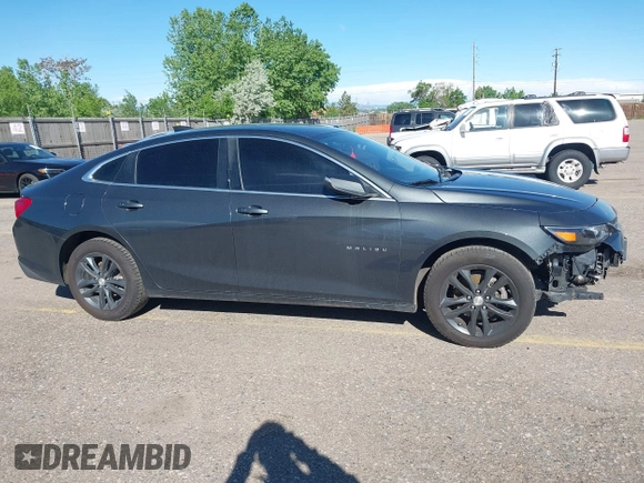 2018 Chevrolet Malibu LT z VIN 1G1ZD5STXJF239806, wystawiony jako IAAI lot #42175966 z przebiegiem 160 282 mil mil oraz . Historia ofert i sprzedaży dostępna na DreamBid. Obrazek 13.
