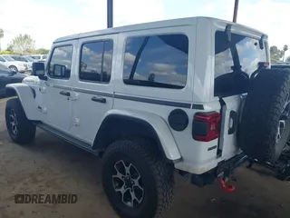 2022 Jeep Wrangler Unlimited Rubicon z VIN 1C4JJXFM6NW234295, wystawiony jako IAAI lot #41906475 z przebiegiem 47 546 mil mil oraz . Historia ofert i sprzedaży dostępna na DreamBid. Obrazek 3.