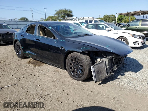 2016 Tesla Model S 90D with VIN 5YJSA1E20GF169954, listed as a Copart auction lot 61974475 with 124,560 mi miles and Salvage title. Bid and sale history available at DreamBid. Image 4.