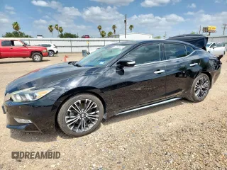 2016 Nissan Maxima SL with VIN 1N4AA6AP1GC409820, listed as a Copart auction lot 60888725 with 124,998 mi miles and Salvage title. Bid and sale history available at DreamBid. Image 1.